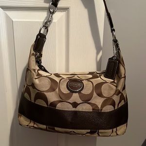 Coach shoulder bag. Used but like new. Wallet available to bundle